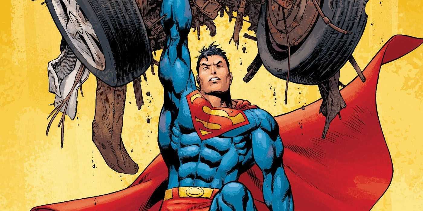 Superman si jednou rukou drží auto cez ruku