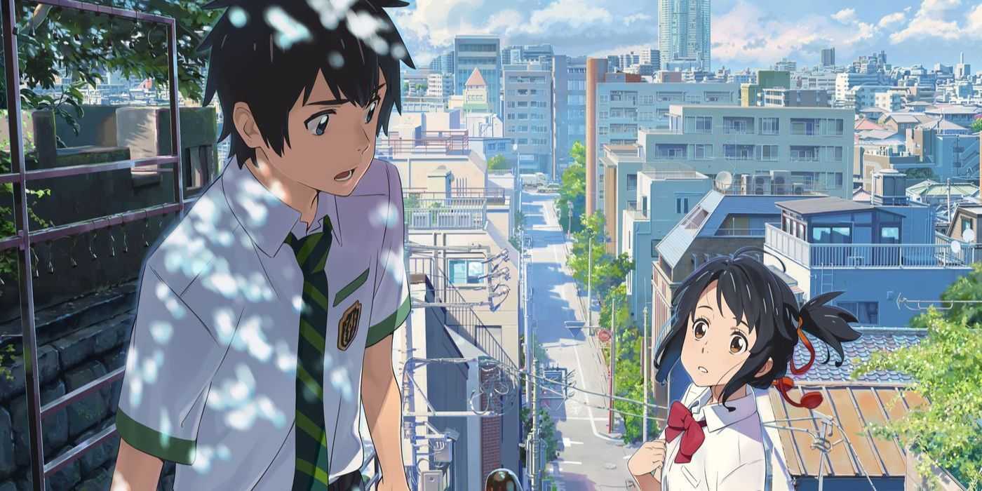 Mitsuha y Taki hablando en la ciudad en Tu Nombre.