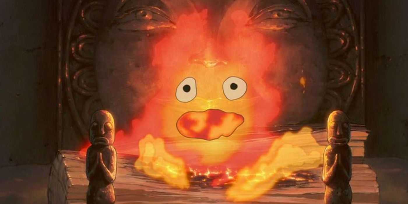 Calcifer sitzt in seinem Stapel Brennholz im Schloss