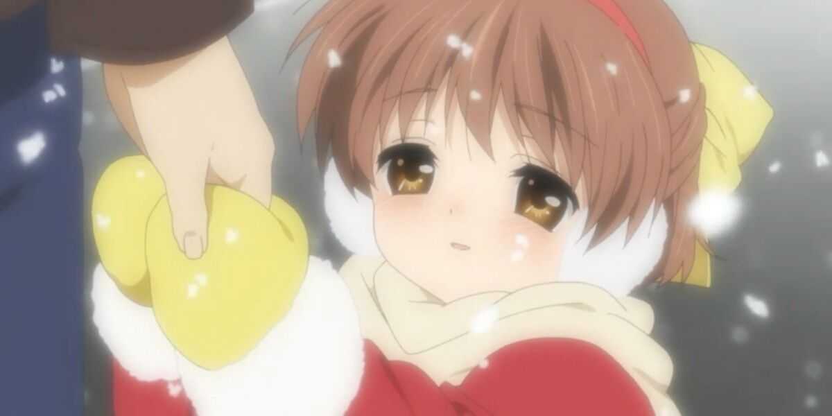Clannad Ushio drží svojho otca za ruku, zatiaľ čo na jej poslednej ceste z Clannad padá sneh.