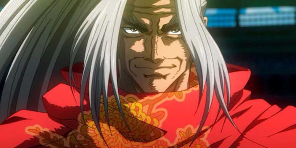 Kojiro Sasaki sonriendo mientras se enfrenta a Poseidón en Record of Ragnarok.