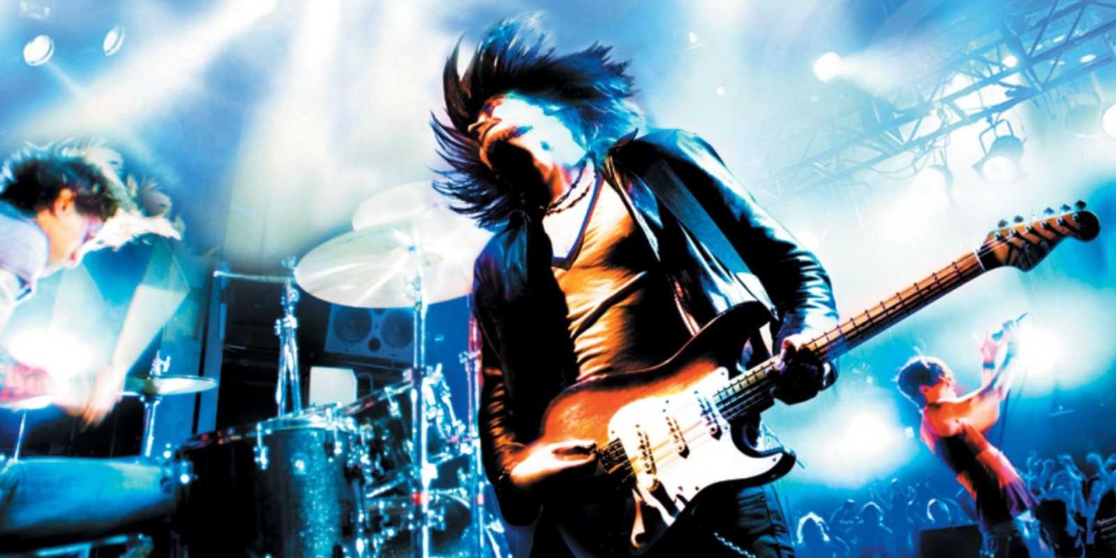 Una portada de Rock Band muestra a una banda dando un concierto electrizante.