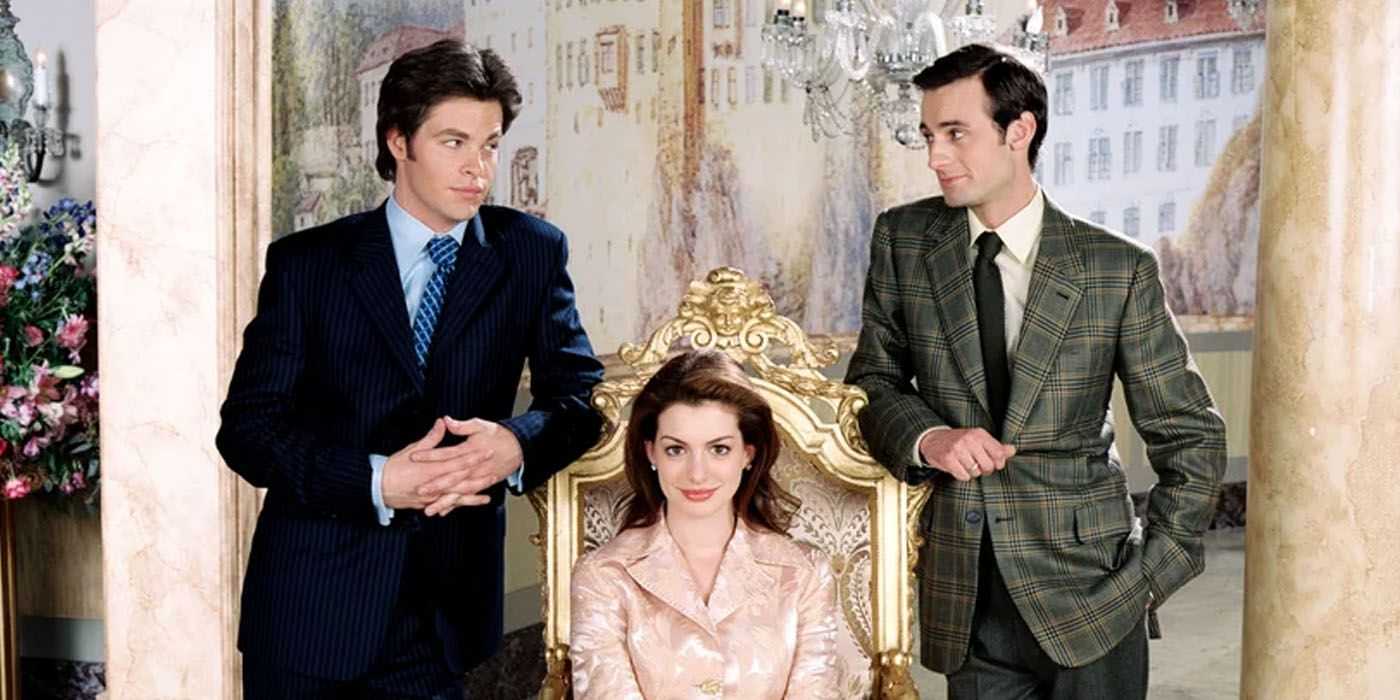 Mia Thermopolos (Anne Hathaway) sentada entre Michael y Nicholas en Princess Diaries