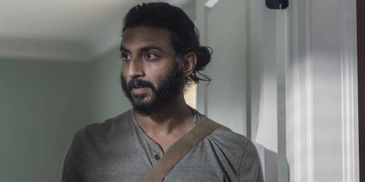 Siddiq schaut in „The Walking Dead“ mit leichter Überraschung im Gesicht nach rechts