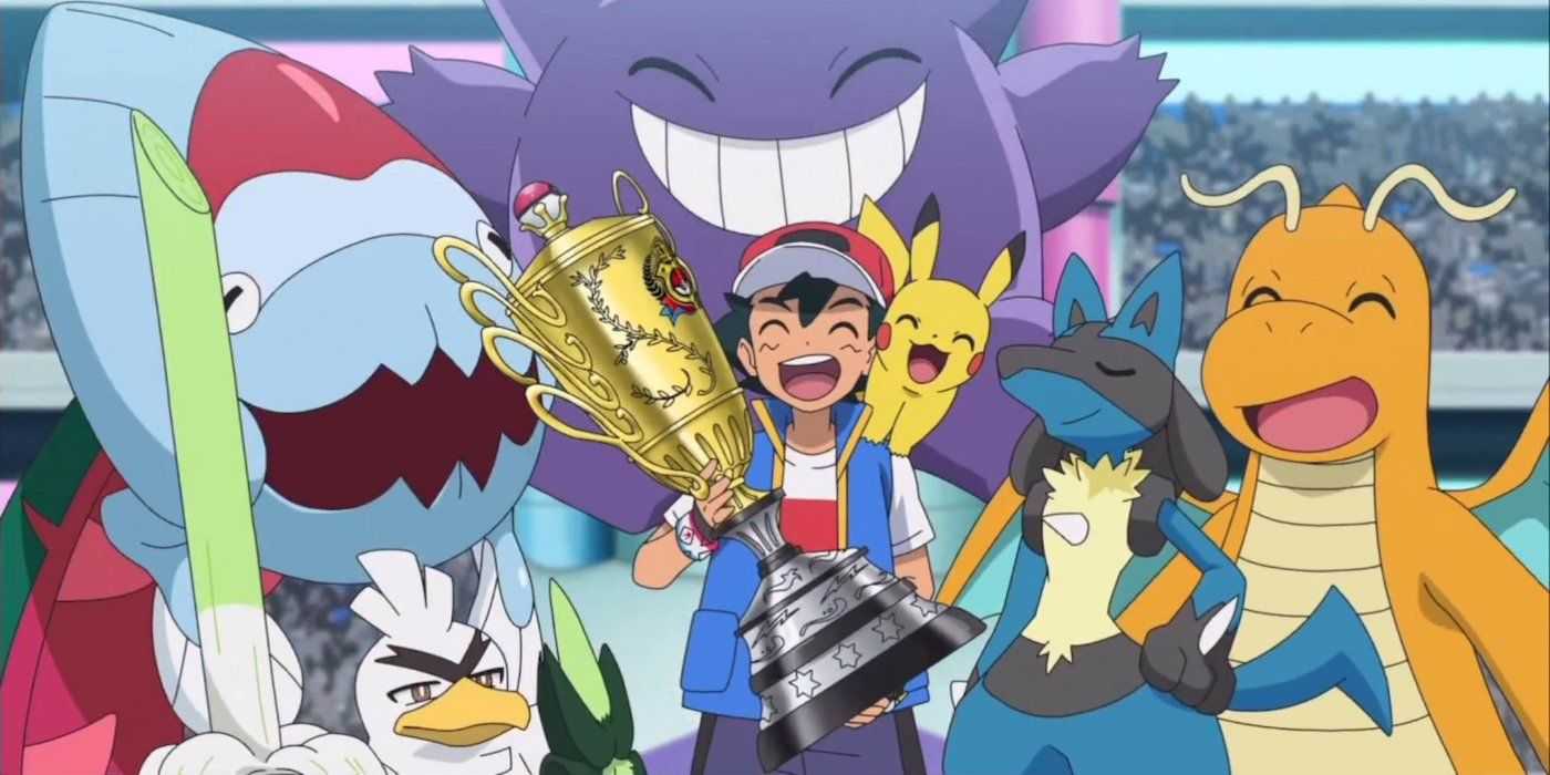 Ash y su equipo de Journeys sostienen el trofeo de la Serie de Coronación Mundial en Pokémon Journeys.